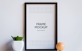 3D植物和木球装饰品照片黑画框样机 Photo Black Frame Mockup With 3D Ornament