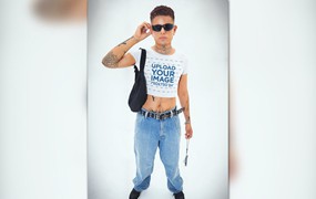 00年代主题纹身男子服装样机图 00s-Themed Mockup Featuring a Tattooed Man