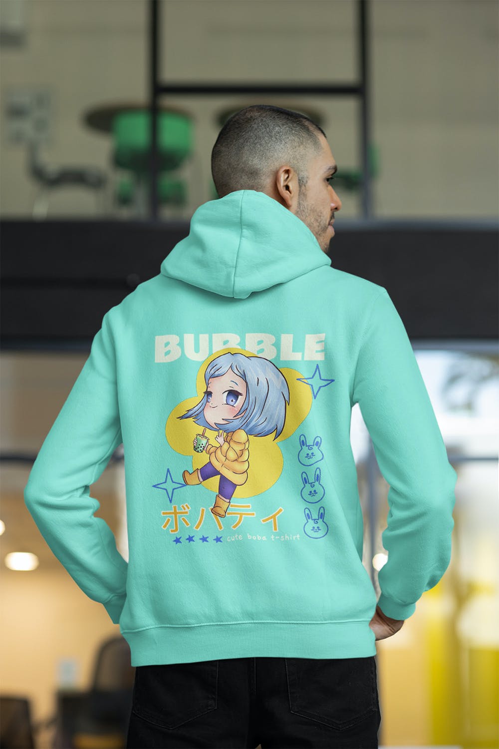 办公室男性背影连帽衫设计样机图 Back View of a Man Wearing a Hoodie at The Office 样机素材 第2张